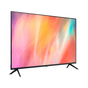 TV Samsung AU7000 exibindo imagens vibrantes em uma sala elegante com decoração moderna.